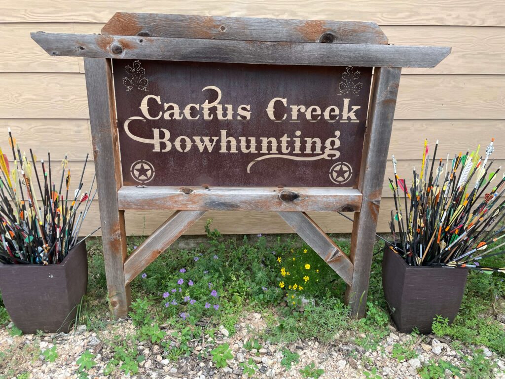 Front side name plate with the inscription Cactus Creek Bow Hunting
